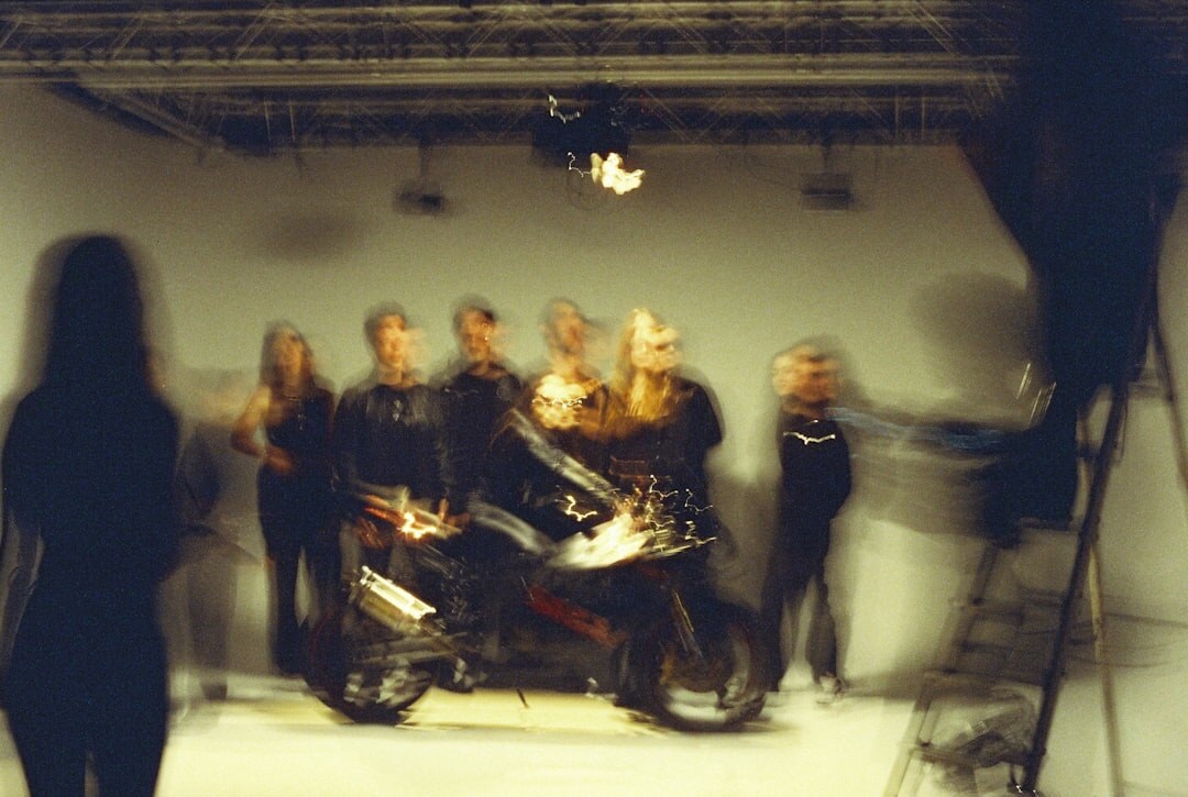 Broadcast production team standing together in a television studio