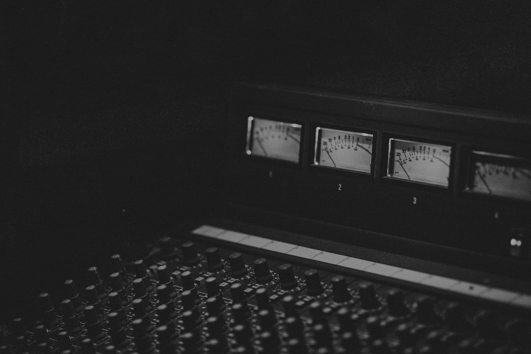 Close up of a video switcher panel with multiple camera preview monitors